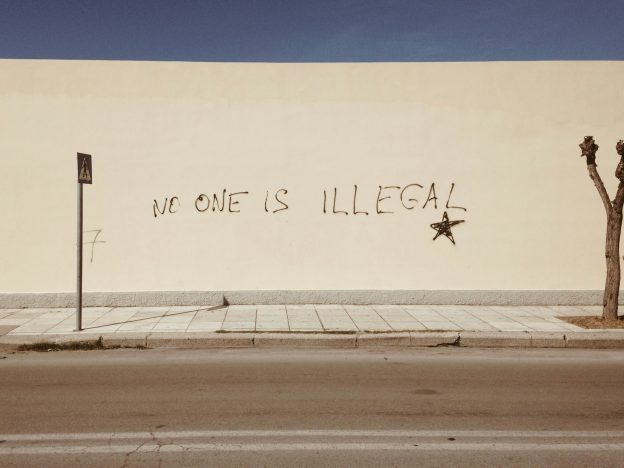 immigration research paper topics